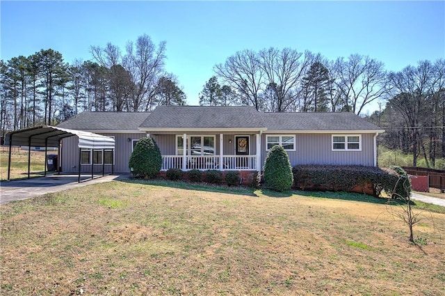 ranch-style home with driveway, a carport, covered porch, and a front lawn