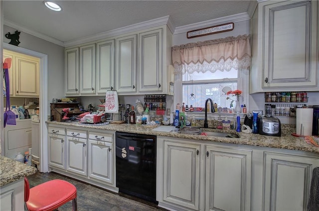 kitchen featuring ornamental molding, a sink, black dishwasher, a textured ceiling, and washer and clothes dryer