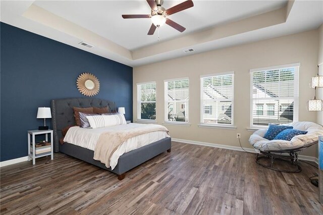 438 Crescent Woode Dr, Dallas, GA 30157 - bedroom featuring a raised ceiling, wood finished floors, visible vents, and baseboards
