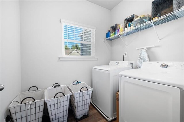 438 Crescent Woode Dr, Dallas, GA 30157 - clothes washing area featuring dark wood finished floors, washing machine and clothes dryer, and laundry area