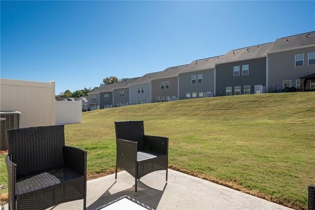 438 Crescent Woode Dr, Dallas, GA 30157 - view of yard with central air condition unit, a residential view, and a patio area
