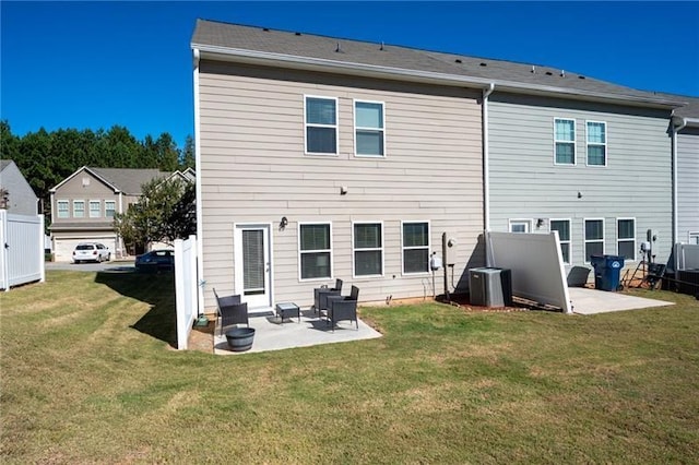 438 Crescent Woode Dr, Dallas, GA 30157 - rear view of house with cooling unit, a lawn, and a patio