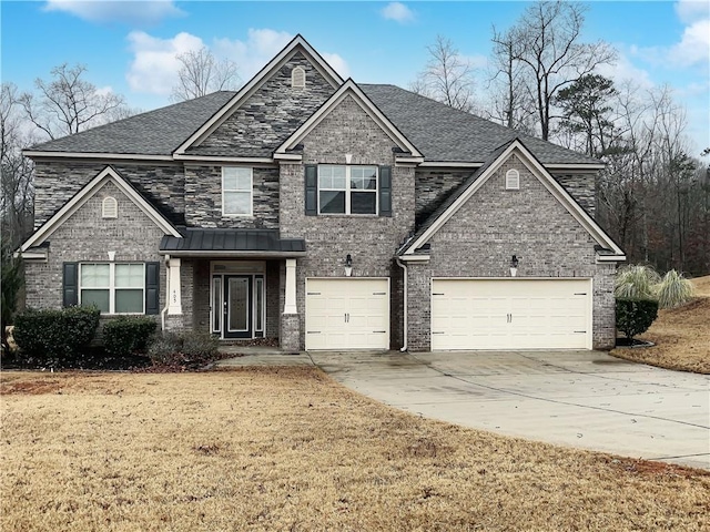 craftsman-style house with a garage and a front yard