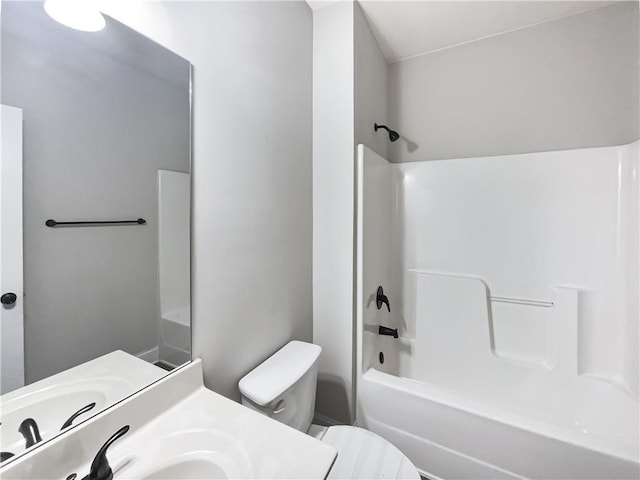 full bathroom with  shower combination, toilet, and vanity