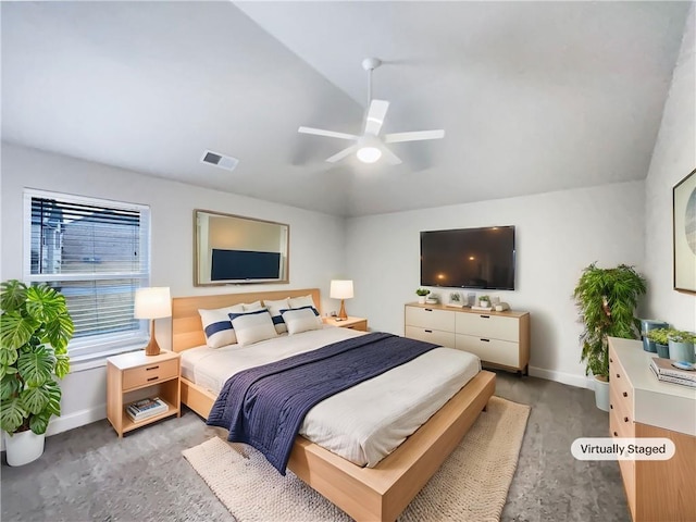 bedroom featuring vaulted ceiling and ceiling fan