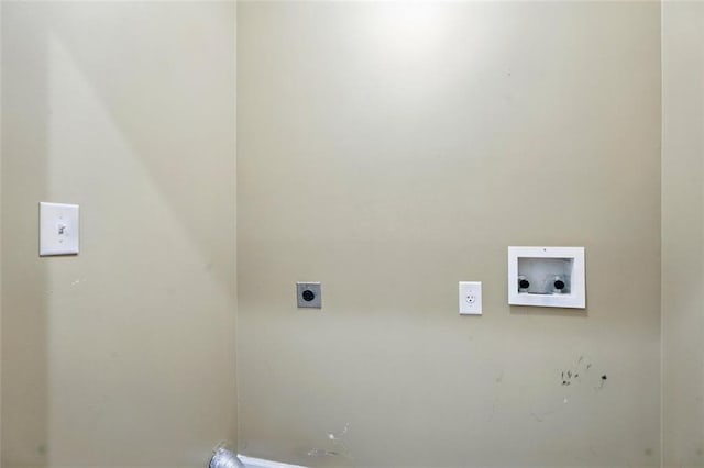laundry room featuring laundry area, washer hookup, and electric dryer hookup