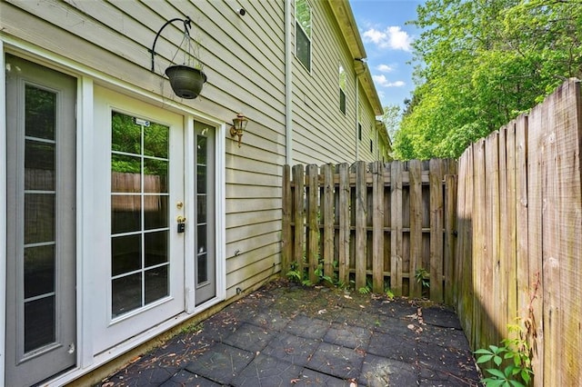 view of patio / terrace featuring fence