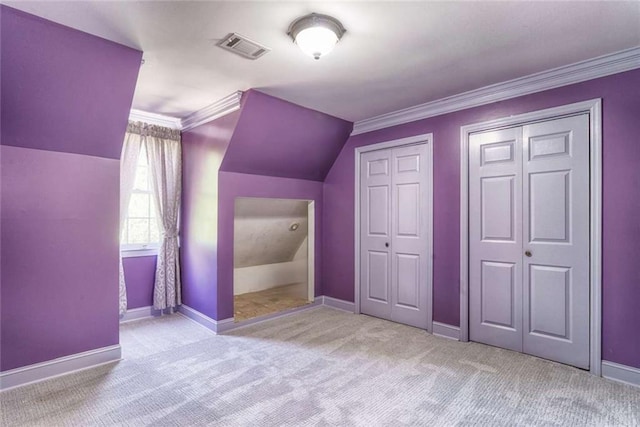bonus room with carpet flooring, baseboards, and vaulted ceiling