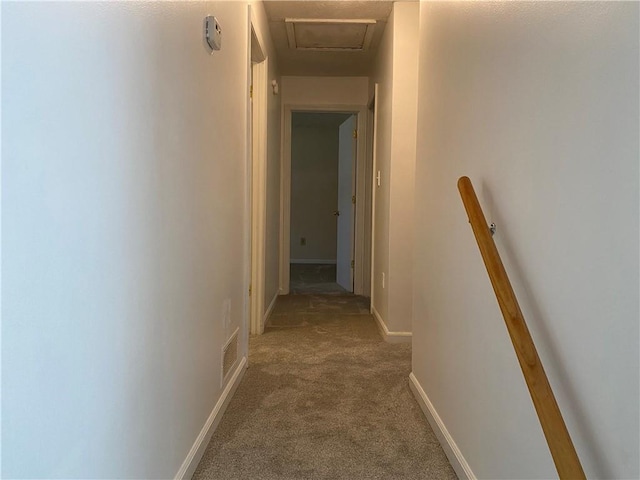 hallway with carpet