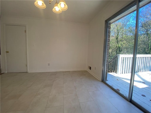 unfurnished room with light tile patterned floors and a chandelier