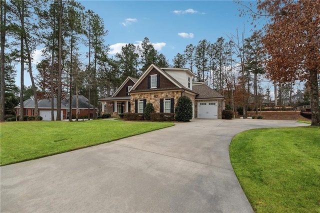 craftsman-style house featuring a garage and a front lawn