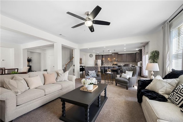 living room featuring ceiling fan