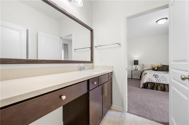 bathroom featuring vanity and tile patterned flooring