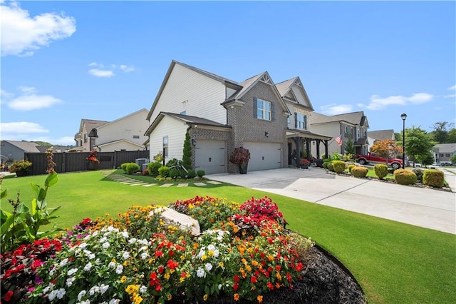 view of front of home featuring a front yard, a garage, and central AC