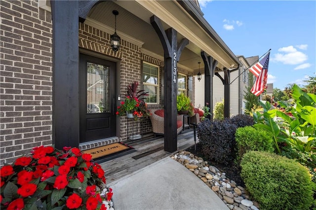 doorway to property with a porch