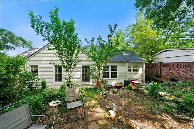 back of property with fence