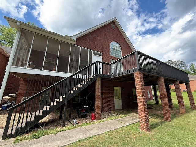 349 Bald Rock Rd, Oxford, GA 30054 - back of house with a sunroom, brick siding, a deck, stairway, and a yard