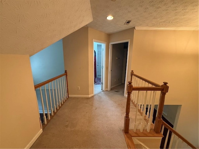 349 Bald Rock Rd, Oxford, GA 30054 - corridor with a textured ceiling, baseboards, an upstairs landing, and carpet floors
