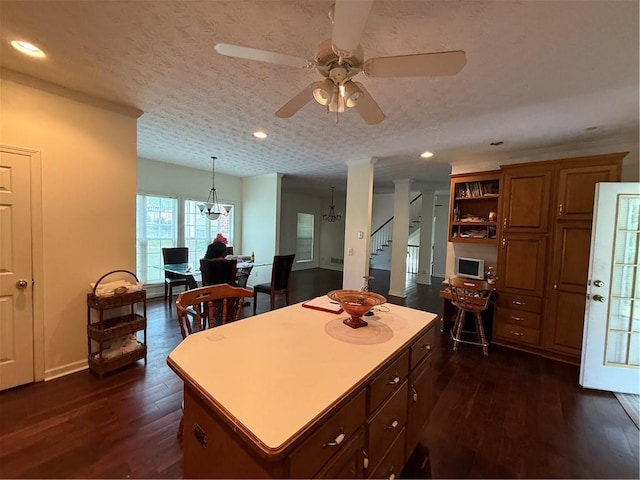 349 Bald Rock Rd, Oxford, GA 30054 - kitchen featuring a kitchen island, dark wood finished floors, ceiling fan, recessed lighting, and a chandelier