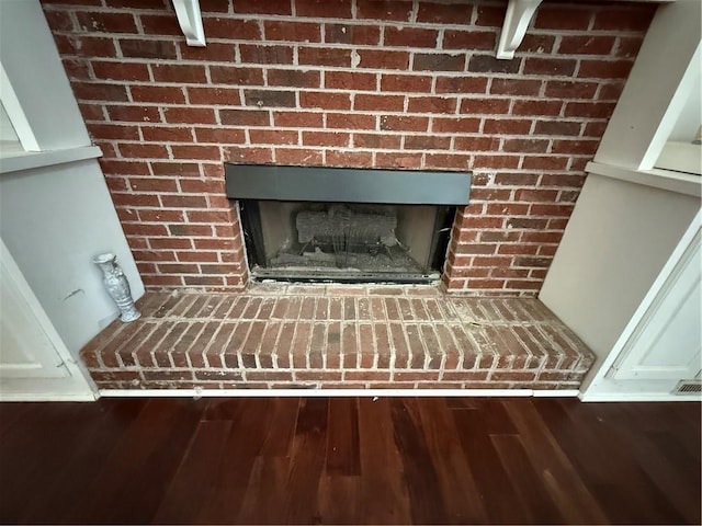 349 Bald Rock Rd, Oxford, GA 30054 - detailed view of wood finished floors and a fireplace