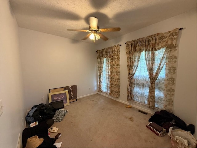 349 Bald Rock Rd, Oxford, GA 30054 - carpeted empty room featuring a ceiling fan and baseboards