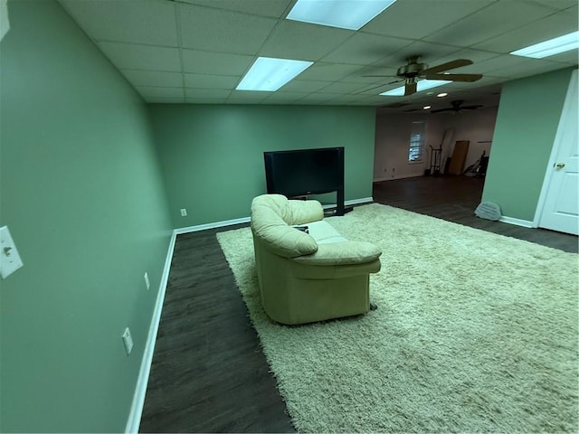 349 Bald Rock Rd, Oxford, GA 30054 - living area featuring baseboards, a drop ceiling, ceiling fan, and dark wood-style floors