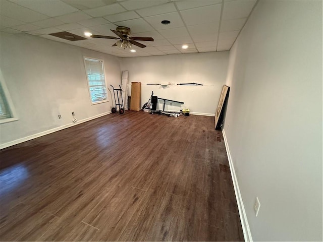349 Bald Rock Rd, Oxford, GA 30054 - empty room with baseboards, dark wood finished floors, a ceiling fan, a drop ceiling, and recessed lighting