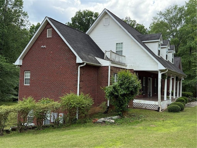 349 Bald Rock Rd, Oxford, GA 30054 - view of property exterior featuring a yard, a porch, and brick siding