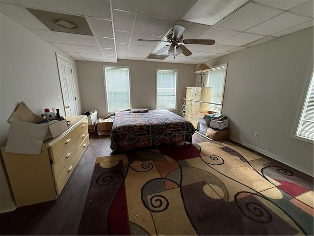 349 Bald Rock Rd, Oxford, GA 30054 - bedroom featuring a drop ceiling, a ceiling fan, and baseboards