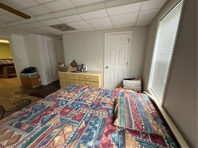 349 Bald Rock Rd, Oxford, GA 30054 - bedroom featuring a drop ceiling and multiple windows