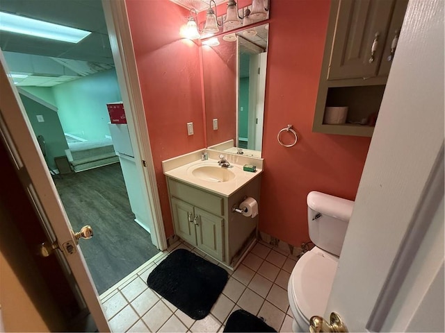 349 Bald Rock Rd, Oxford, GA 30054 - half bathroom featuring vanity, toilet, and tile patterned flooring