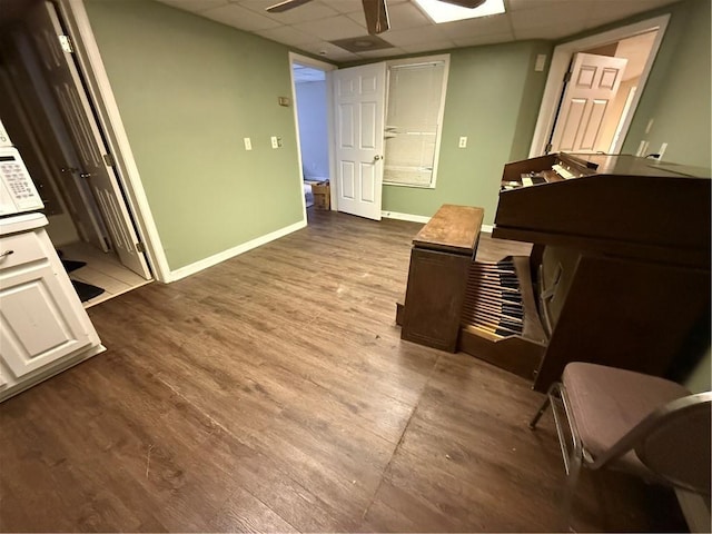 349 Bald Rock Rd, Oxford, GA 30054 - sitting room featuring a paneled ceiling, ceiling fan, baseboards, and wood finished floors