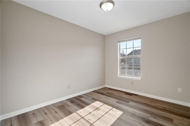 empty room featuring light hardwood / wood-style floors