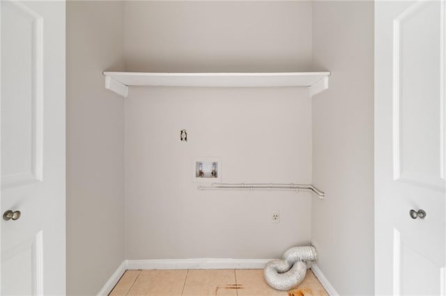 laundry room with light tile patterned floors, hookup for a washing machine, and hookup for an electric dryer