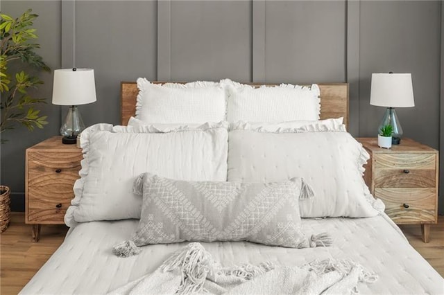 bedroom featuring hardwood / wood-style flooring