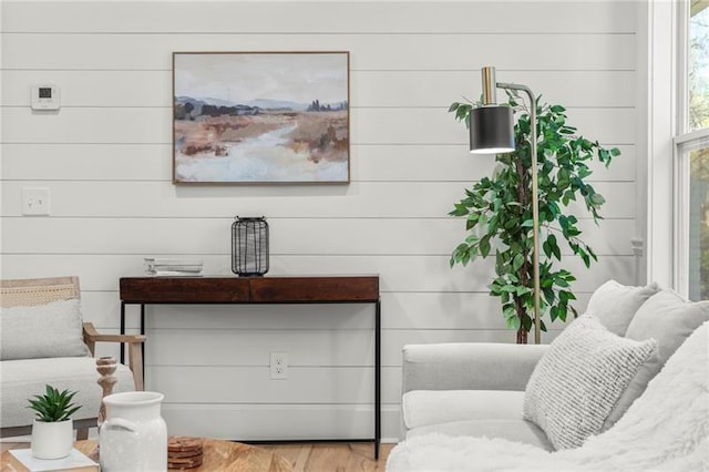 living area with hardwood / wood-style flooring