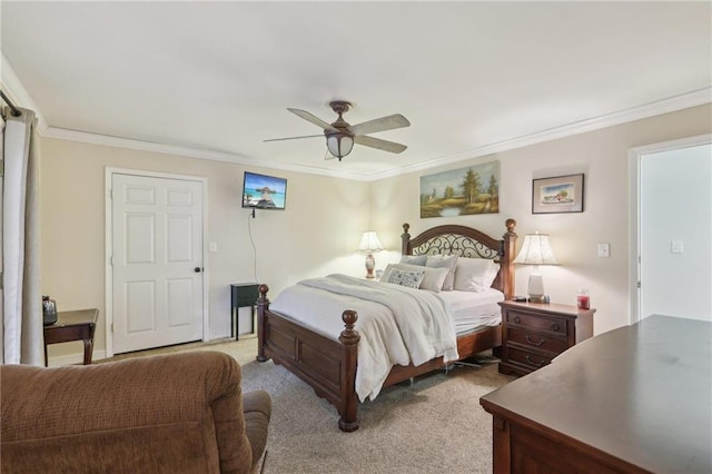 bedroom with crown molding, carpet floors, and ceiling fan