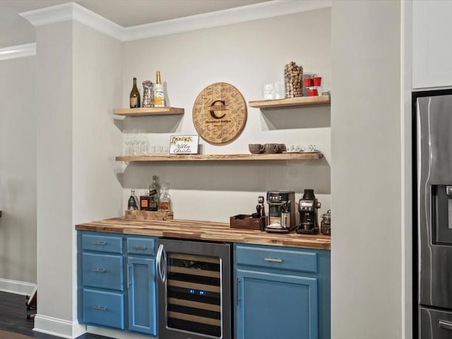 3862 Firewood Ln Unit 110, Suwanee, GA 30024 - indoor wet bar featuring beverage cooler, stainless steel fridge with ice dispenser, crown molding, baseboards, and dark wood-type flooring