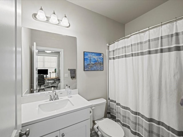 3862 Firewood Ln Unit 110, Suwanee, GA 30024 - bathroom featuring vanity, toilet, and a shower with shower curtain