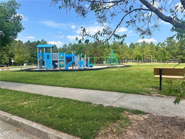 view of playground featuring a lawn