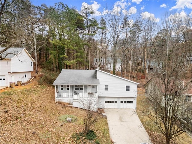 view of front of property with a garage and a porch