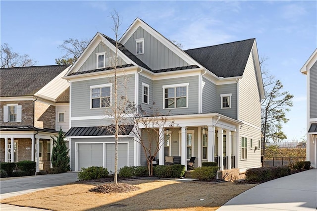 view of front of house featuring a porch and a garage