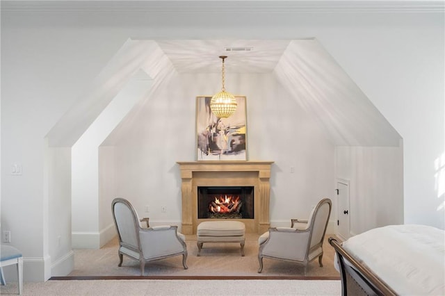 sitting room with lofted ceiling, a chandelier, and light carpet