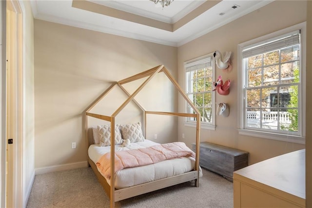 bedroom with light carpet, a raised ceiling, and ornamental molding