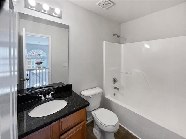 full bathroom featuring vanity, toilet, and shower / washtub combination