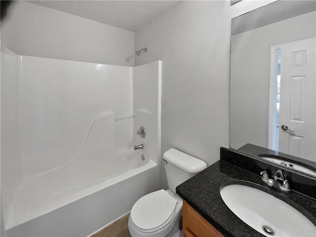 full bathroom with vanity, shower / bathtub combination, and toilet