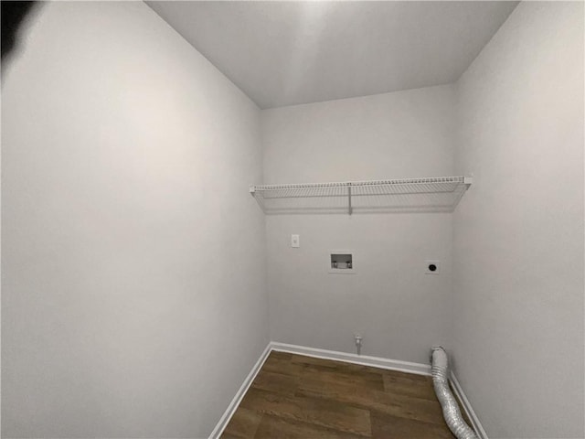 washroom featuring hookup for an electric dryer, dark hardwood / wood-style flooring, and hookup for a washing machine