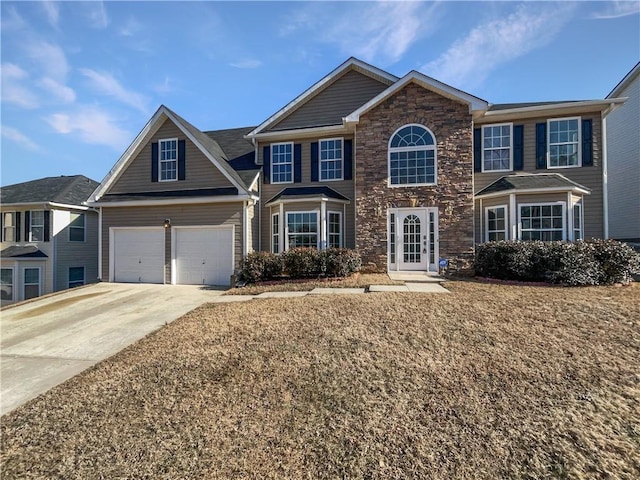 view of front of property with a garage