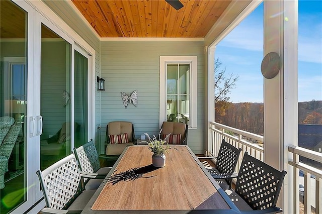 balcony featuring outdoor dining area