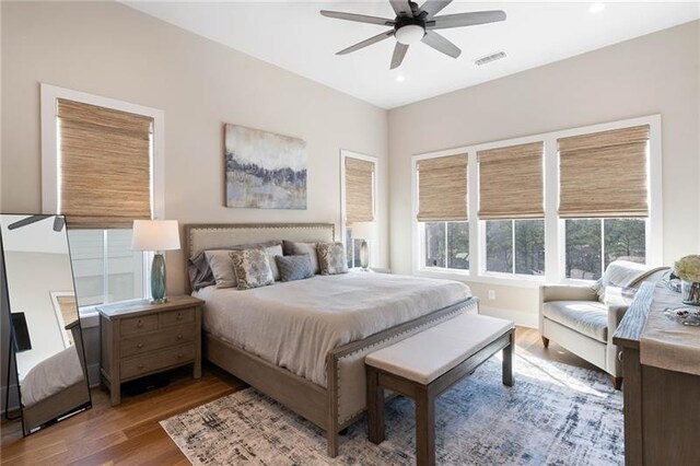 bedroom featuring wood-type flooring and ceiling fan